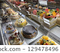 Cakes lined up in a showcase 129478496