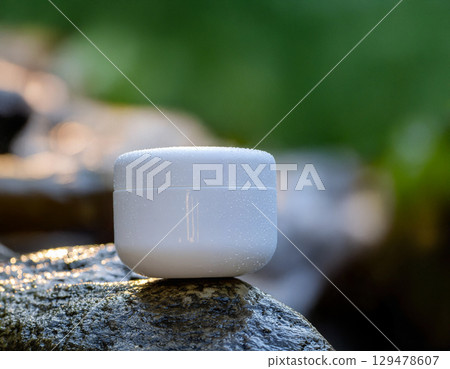 White Cosmetic Cream Jar Mockup with Tropical Leaf and Water Drops 129478607