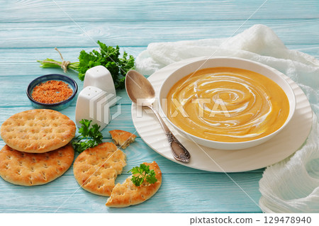 roasted parsnip and carrot soup, top view roasted parsnip and carrot soup, top view 129478940