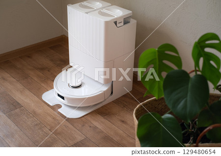 Smart home cleaning robot cleans floors independently for a clean and comfortable living space without effort 129480654