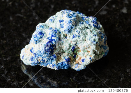 sample of raw azurite, gibbsite mineral on black sample of raw azurite, gibbsite mineral on black 129480876