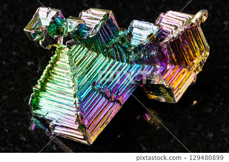 raw grown bismuth crystals mineral on black raw grown bismuth crystals mineral on black 129480899