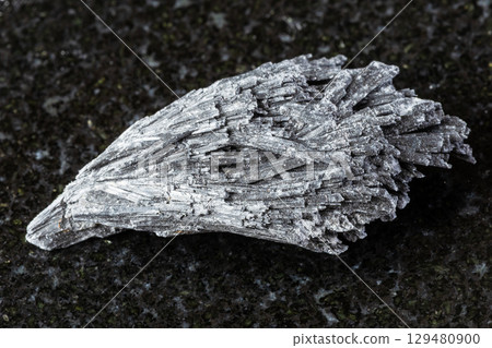 sample of rough black kyanite mineral on black sample of rough black kyanite mineral on black 129480900