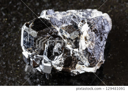 raw druse of melanite andradite garnets on black raw druse of melanite andradite garnets on black 129481091