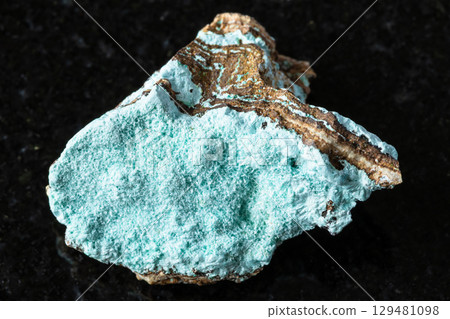 sample of raw aurichalcite mineral on black 129481098