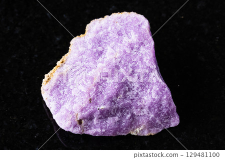 sample of raw phosphosiderite mineral on black 129481100