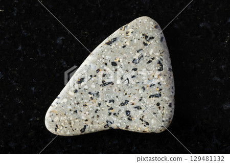 sample of polished andesite mineral on black 129481132