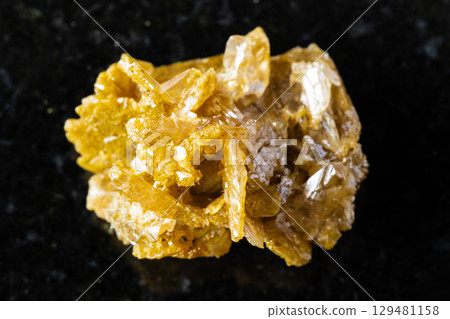 sample of raw cerussite mineral on black granite 129481158