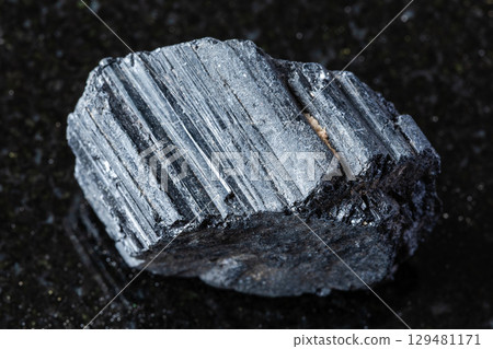 sample of raw tourmaline schorl rock on black sample of raw tourmaline schorl rock on black 129481171
