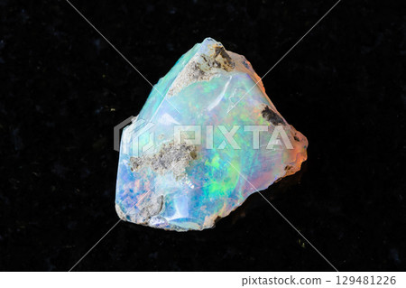 sample of raw ethiopian opal mineral on black sample of raw ethiopian opal mineral on black 129481226