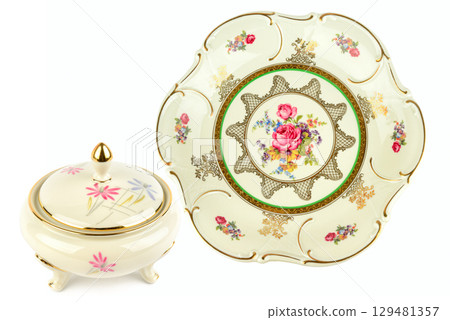 Vintage porcelain candy bowl and a porcelain tray isolated on white. Collage. Vintage porcelain candy bowl and a porcelain tray isolated on white. Collage. 129481357