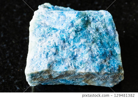 sample of rough lazurite rock on black sample of rough lazurite rock on black 129481382