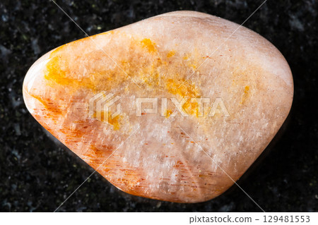 sample of polished iridescent feldspar on black 129481553