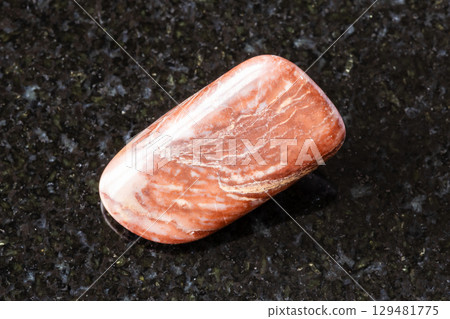 tumbled lemesite stromatolitic limestone on black 129481775