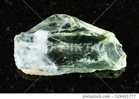 sample of rough prasiolite mineral on black sample of rough prasiolite mineral on black 129481777