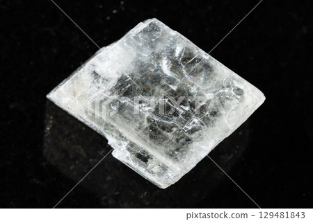 sample of rough iceland spar mineral on black sample of rough iceland spar mineral on black 129481843