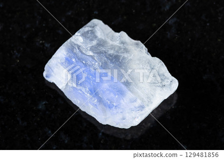 rough adularia moonstone mineral on black 129481856