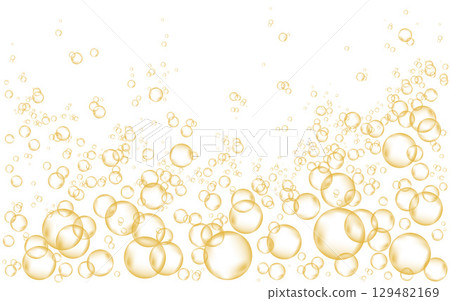 Gold fizzing air bubbles isolated on white background. 129482169