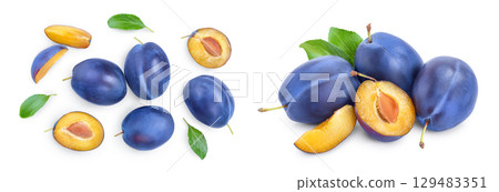 fresh plum and half with leaves isolated on white background. Top view. Flat lay fresh plum and half with leaves isolated on white background. Top view. Flat lay 129483351