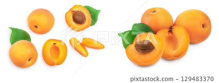 Apricot fruit with half isolated on white background macro Apricot fruit with half isolated on white background macro 129483370