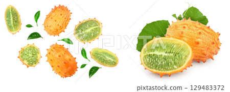 Kiwano or horned melon with leaves isolated on white background, Top view. Flat lay. 129483372