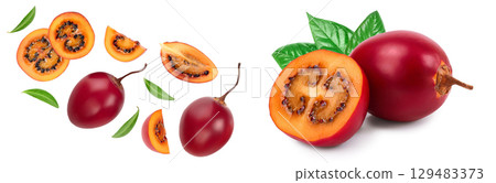 Fresh tamarillo fruit with leaves isolated on white background. Top view. Flat lay Fresh tamarillo fruit with leaves isolated on white background. Top view. Flat lay 129483373