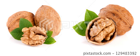 Walnuts with leaf isolated on white background Walnuts with leaf isolated on white background 129483392