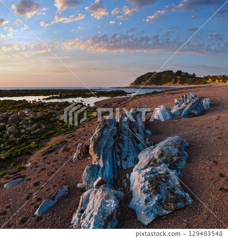 Sunset ocean view from beach Sunset ocean view from beach 129483548