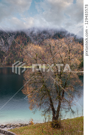 Mountain alpine autumn lake Achensee, Alps, Tirol, Austria. 129483578