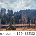 Mountain alpine autumn lake Schwarzsee, Kitzbuhel, Tirol, Austria Alps. 129483582