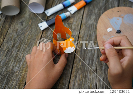 DIY and kid's creativity. Step by step instruction: how to make tiger from toilet roll tube. Step five: draw the tiger's face. DIY and kid's creativity. Step by step instruction: how to make tiger from toilet roll tube. Step five: draw the tiger's face. 129483631