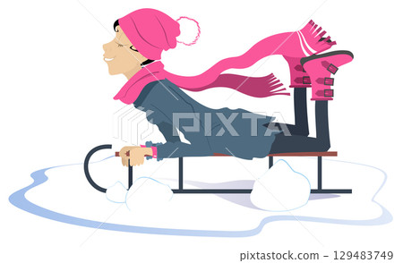 Sledding young female person. Pretty young girl rides on sledge in warm clothes like hat and scarf. Isolated on white background Sledding young female person. Pretty young girl rides on sledge in warm clothes like hat and scarf. Isolated on white background 129483749