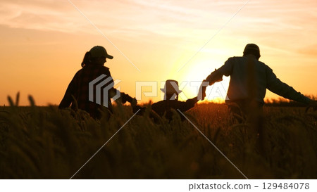 happy family running wheat field. family farm. father mother child kid girl running wheat field sunset. happy family life concept. woman man husband wife child daughter running farm. agriculture happy family running wheat field. family farm. father mother child kid girl running wheat field sunset. happy family life concept. woman man husband wife child daughter running farm. agriculture 129484078