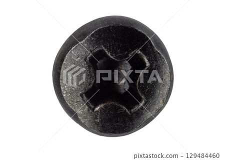 Close up of black Phillips screw head Close up of black Phillips screw head 129484460