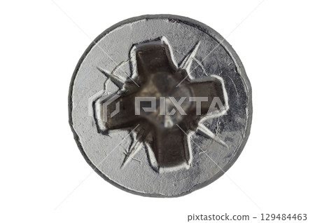 Close up of silver Phillips screw with star marks Close up of silver Phillips screw with star marks 129484463