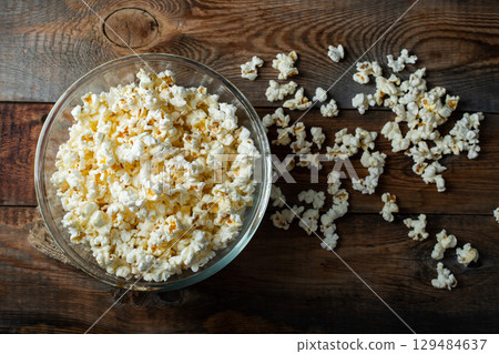 Pop corn on wood color background.Food and snack concepts ideas.Minimal style top view mockup 129484637