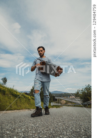 Man Playing Accordion In The South Italy Nature 129484759