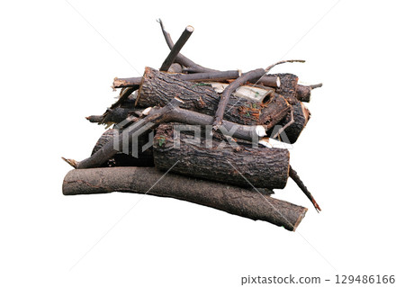 Pile of rough weathered wooden logs with textured bark 129486166