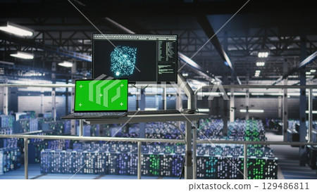 Mockup notebook in data center displaying neural network activity. Automated infrastructure green screen laptop workstation on industrial platform inside server hub showing AI machine learning scripts Mockup notebook in data center displaying neural network activity. Automated infrastructure green screen laptop workstation on industrial platform inside server hub showing AI machine learning scripts 129486811