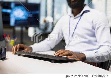 Close up of software developer adjusting machine learning algorithms parameters at work to automate tasks. Tech company IT expert working with AI driven insights for code optimization 129486864