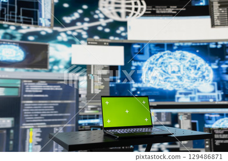 Laptop running isolated mockup screen next to AI neural networks system, used for practicing deep learning and cloud computing. Tech implementing artificial intelligence brain. 129486871
