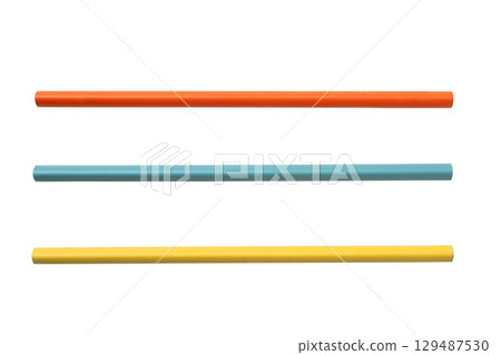 Row of unsharpened colorful wooden pencils isolated over a white background. Concept of stationery Row of unsharpened colorful wooden pencils isolated over a white background. Concept of stationery 129487530