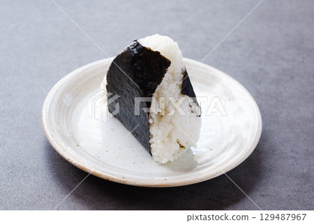 Onigiri - Delicious rice balls made with freshly cooked rice 129487967