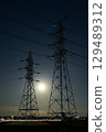 The beauty of the moon, pylons, and stars on a winter night 129489312