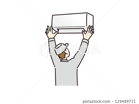 A worker installing an air conditioner 129489711
