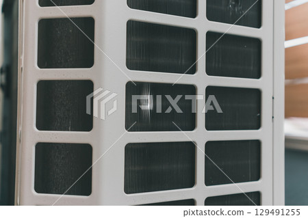 Dents in the aluminum fins of the air conditioner outdoor unit Dents in the aluminum fins of the air conditioner outdoor unit 129491255