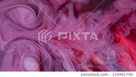 Paint smoke. Blur vapor texture. Defocused purple pink colorful blast flow cloud fume powder on abstract art dark black background. Paint smoke. Blur vapor texture. Defocused purple pink colorful blast flow cloud fume powder on abstract art dark black background. 129491790