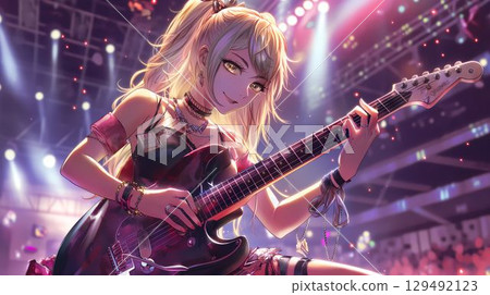 A girl coolly playing an electric guitar on a live stage 129492123
