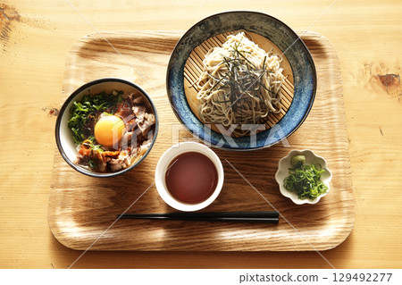 Local cuisine: Omi beef mini beef bowl with green onions and egg and 100% buckwheat soba noodles set 129492277