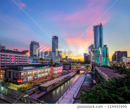Skyscraper and Pratunam pier in Bangkok; water transportation by speed boat is one of the alternative choice for solving the traffic congestion problem in Bangkok. Skyscraper and Pratunam pier in Bangkok; water transportation by speed boat is one of the alternative choice for solving the traffic congestion problem in Bangkok. 129493999